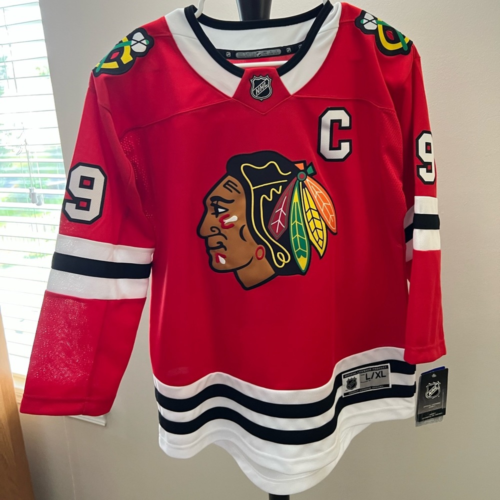 Youth L/XL Toews jersey New with tags.